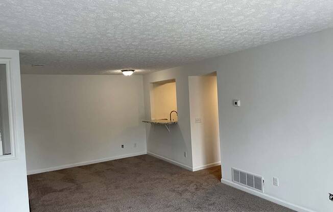 Spacious living room at Camelot East Apartments, Ohio