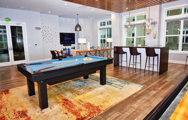 Billiards Table at Pointe at Lake CrabTree Apartment Homes for Rent in Morrisville
