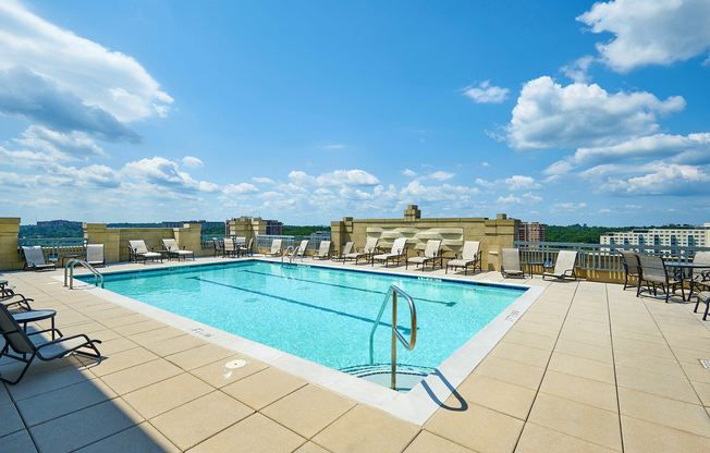 Relax at the rooftop swimming pool with two marked lap lanes and expansive sundeck at Meridian at Grosvenor Station, offering a luxury outdoor oasis with panoramic views of North Bethesda and easy access to the nearby Grosvenor-Strathmore