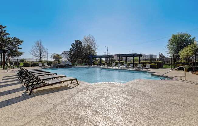 the swimming pool at the preserve at polo ridge apartments