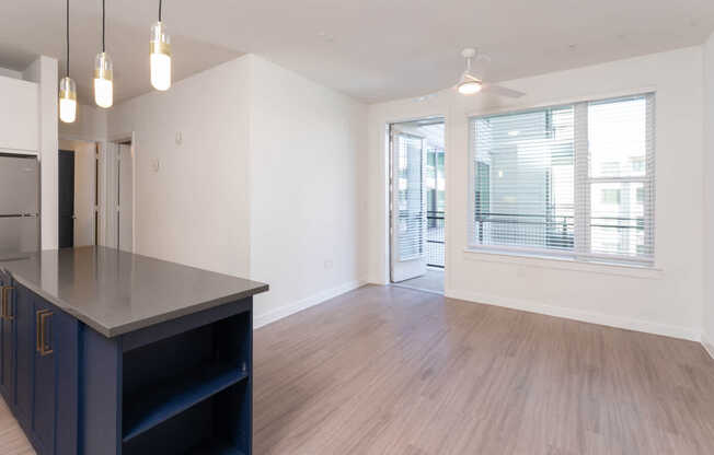 Living Room with Balcony and Hard Surface Flooring