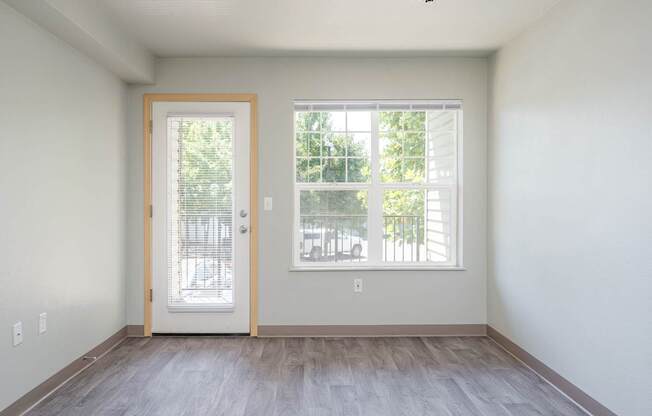 A room with a door and a window.