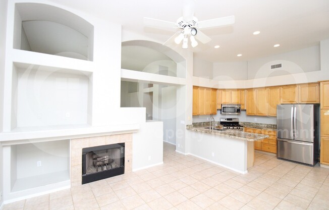 5997 W AURORA DR
