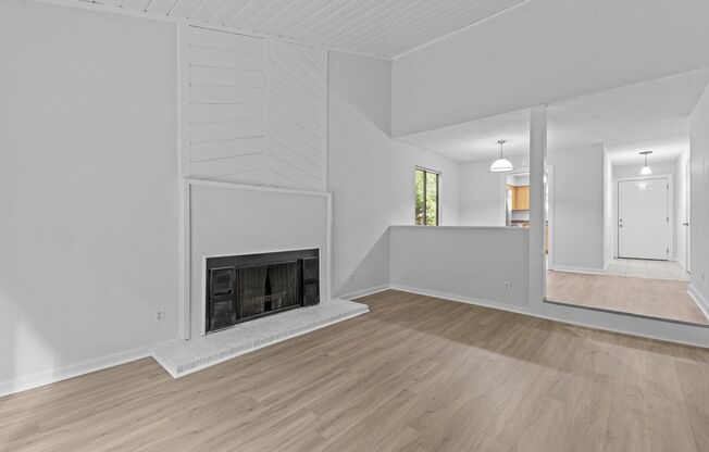 AVAILABLE NOW - Updated 2 Bedroom Duplex w/ Fenced-in Backyard, Large Deck, LVP Floors, Pet Friendly!