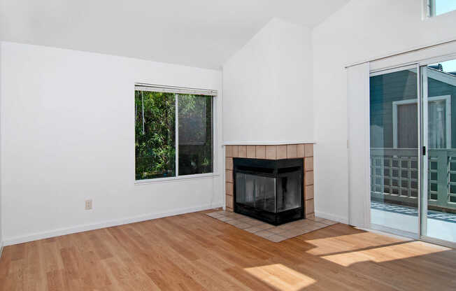 Living Room with Fireplace and Balcony