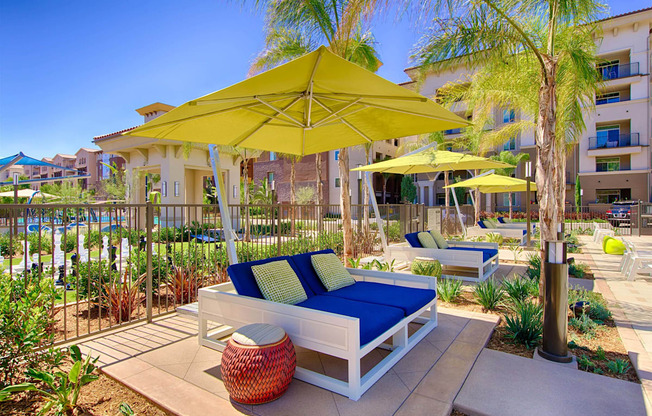 A sunny day at the outdoor seating area of a hotel.
