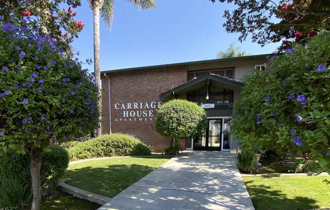 a sidewalk in front of the carolina house building