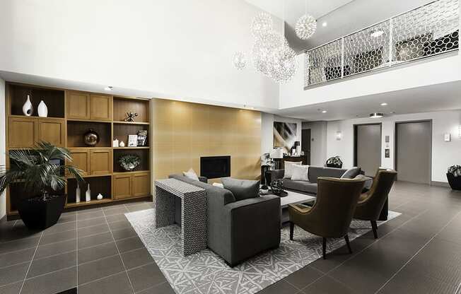 Lobby with seating area and fireplace at Axis, Seattle, 98109