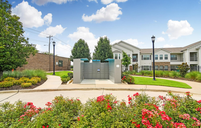 the preserve at ballantyne commons community entrance with flowering plants and buildings