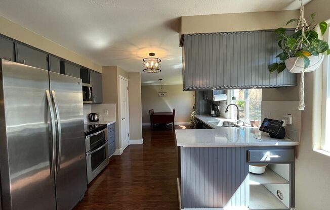 Astounding 3 bed 3 bathroom home in Beaverton! Updated kitchen& Bathrooms! Beautiful fenced Yard w/ RV Parking!