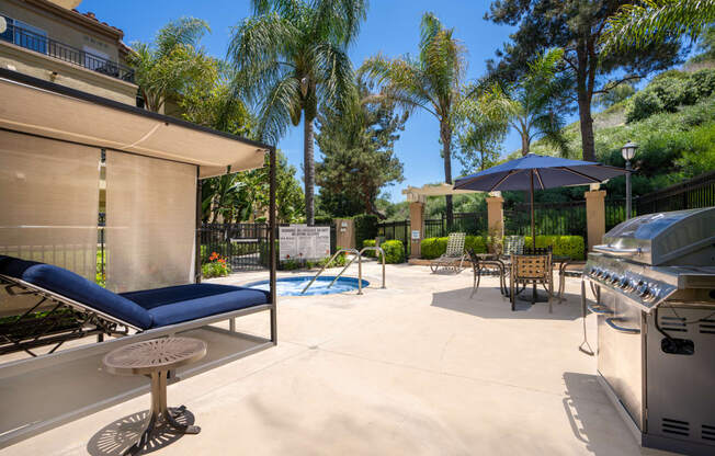 Daybed, spa and BBQ at 55+ FountainGlen Laguna Niguel