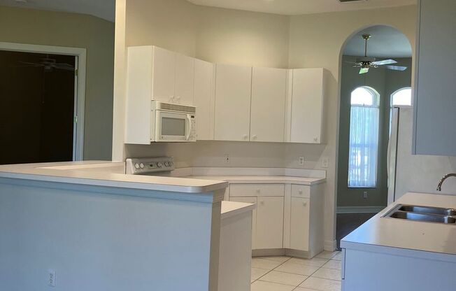 UNFURNISHED ANNUAL RENTAL IN PUNTA GORDA ISLES ON A GOLF COURSE WITH COMMUNITY POOL AND CLUBHOUSE