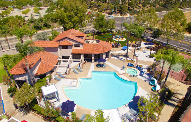 Apartments in Temecula, CA - Vista Promenade Sparkling Swimming Pool Surrounded By Lush Landscaping and Lounge Seating