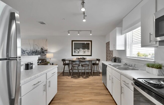 Welcome to Esperanza at Wild Orchid, where modern living meets elegant design. This spacious kitchen features sleek finishes and ample natural light, perfect for creating culinary delights. Schedule your tour today and see it for yourself!