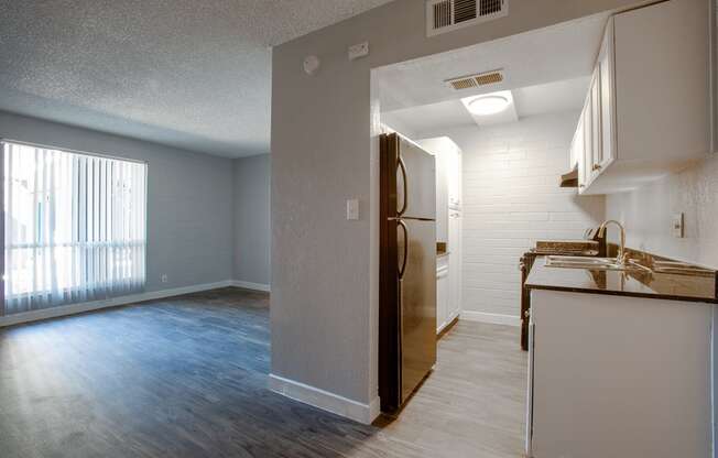 Living Room and Kitchen in One Bedroom Unit at Radius Apartments
