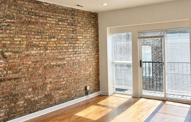 West Rogers Park Apartments With In-Unit Laundry and Exposed Brick