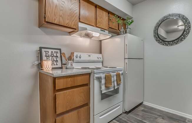 Kitchen Featuring White Appliances