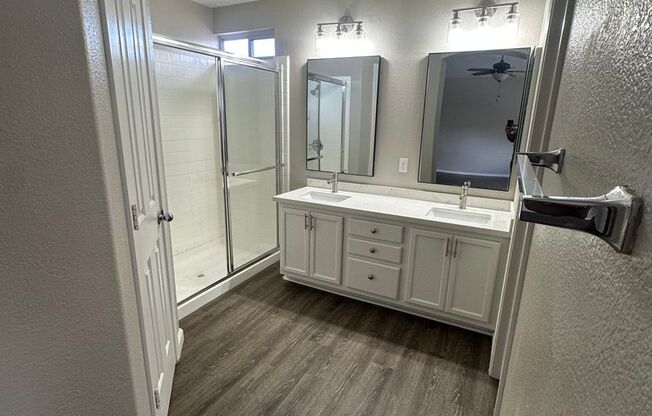 4 bedroom, 3 car garage. Bed and bath downstairs.  No Carpet, Recent renovation