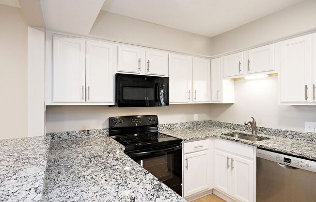 Move-in Ready End-Unit Stonehenge Townhome