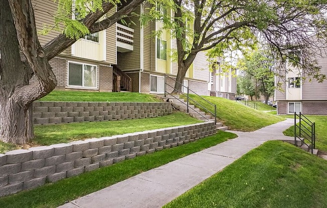 a sidewalk in front of a row of houses  at Summit, Pocatello, Idaho