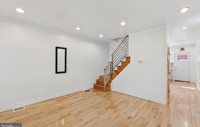 Updated 2BR Townhome with Dual Ensuite Baths, Hardwood Floors & Private Patio in Grays Ferry