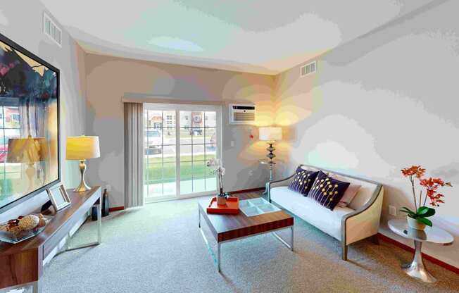 a living room with a couch and a table