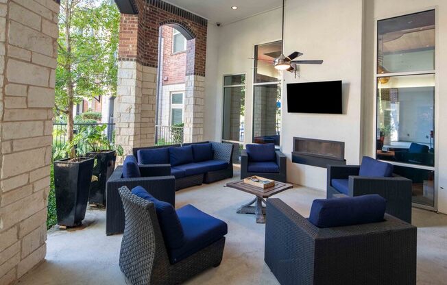 outdoor lounge seating and fireplace
