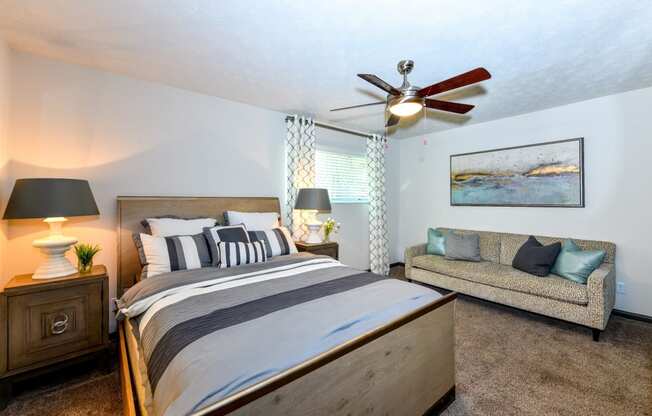 Bedroom with ceiling fan and light at Elme Sandy Springs Apartments, Atlanta, GA, 30350