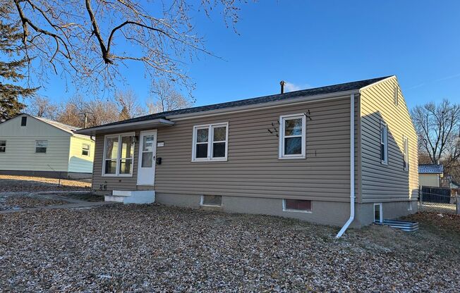 Charming Pet-Friendly Home with Fenced Yard and Detached Garage in East Sioux Falls