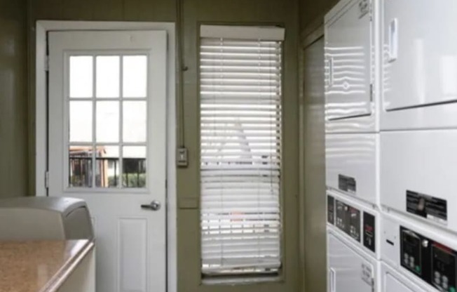 Community Clothes Care Center with Washers and Dryers
