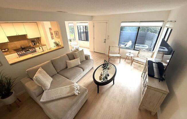 UPDATED TWO BEDROOM / ONE BATH TWO-STORY CONDO IN CAPTAINS COVE