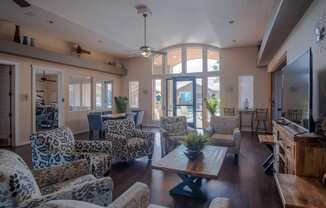 a living room with couches and a coffee table