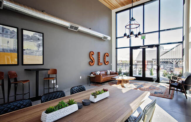 Recreation room with tables and lounge seating areas