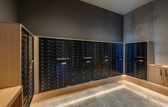 a wine cellar with wooden racks and a concrete floor