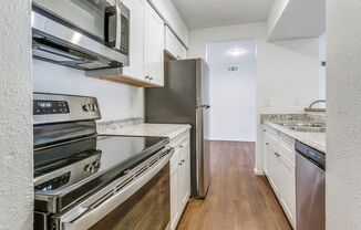 Lock and go GATED COMMUNITY near the night life in Addison. 2br/1ba Condo!