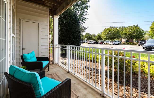 front porch at the enclave at woodbridge apartments in sugar land, tx