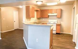 Kitchen with breakfast bar at Cobblestone Corners Apartment Homes, Tennessee, 37216