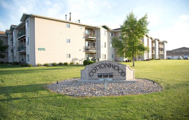 Exterior of Cottonwood Apartment Homes leasing office.