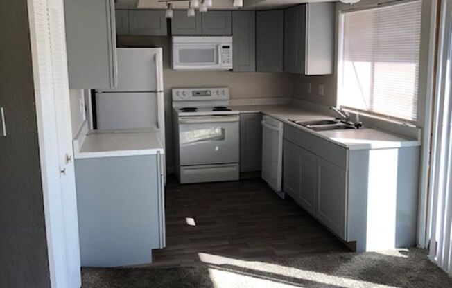 Newly Remodeled 4 bedroom 2.5 bathroom Townhome