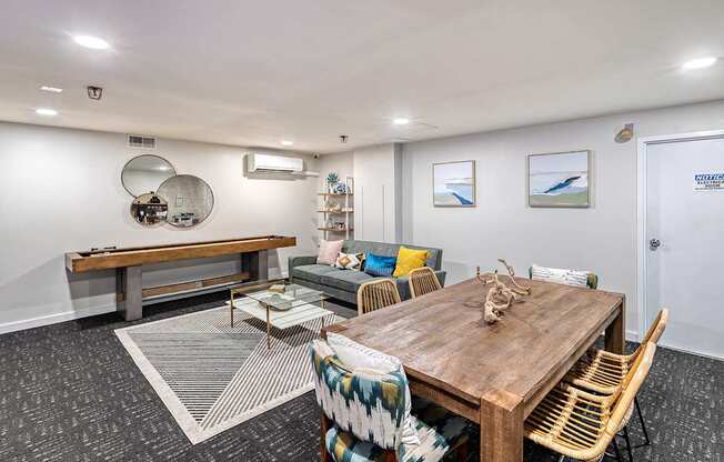 Room with a wooden table and chairs.