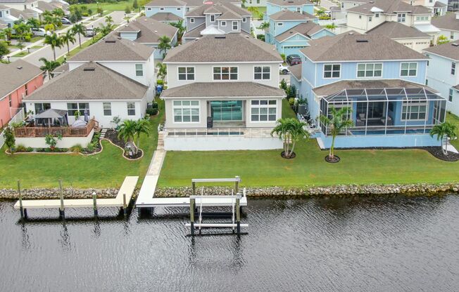 4 Bedroom 3.5 Bath Waterfront  Pool Home in Gated Community
