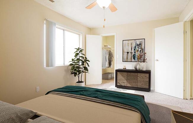 bedroom with large attached closet at georgetowne apartments