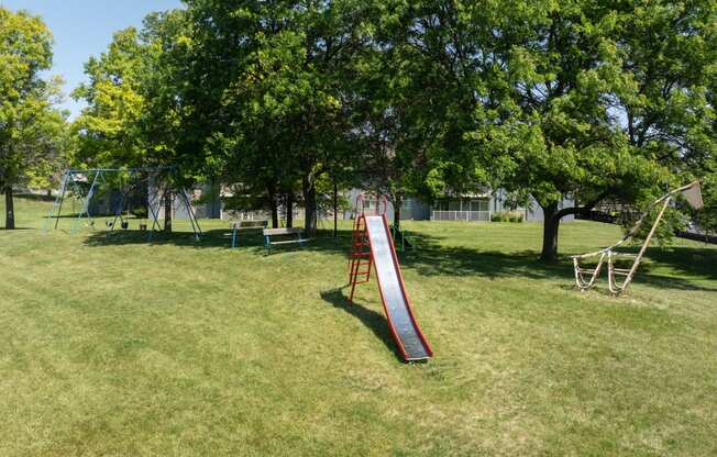 a slide in the middle of a park