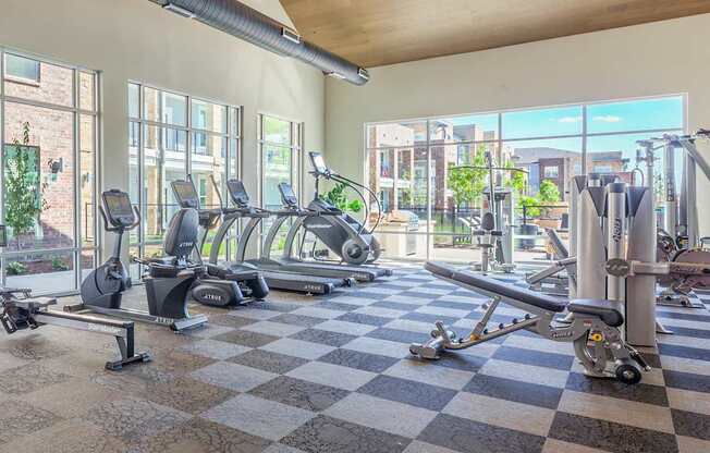the gym at the flats at big tex apartments