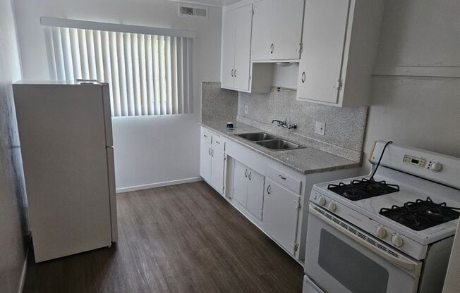 *The Pacific Apartments _5080 Voltaire St. #1-#9