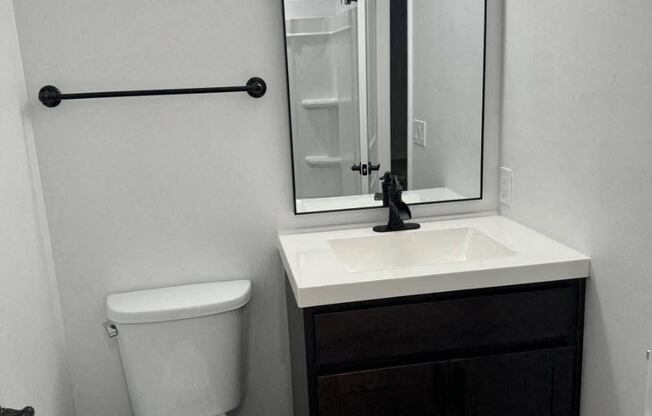 a small bathroom with a toilet and a sink