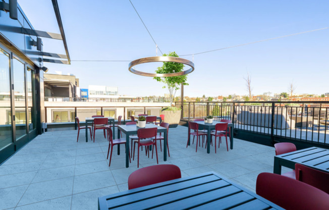 Hangout or dine outdoors with multiple tables on the sky deck