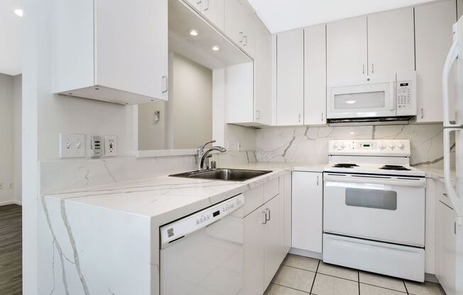 One of Kind 2/2 ! GARAGE with EV Charger  + Add Parking, AC, WD in unit  Walk to BEACH and BAY. Private Patio