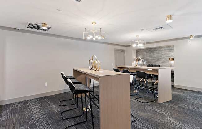 a meeting room with a long table and chairs at The Griffin Royal Oak, Royal Oak