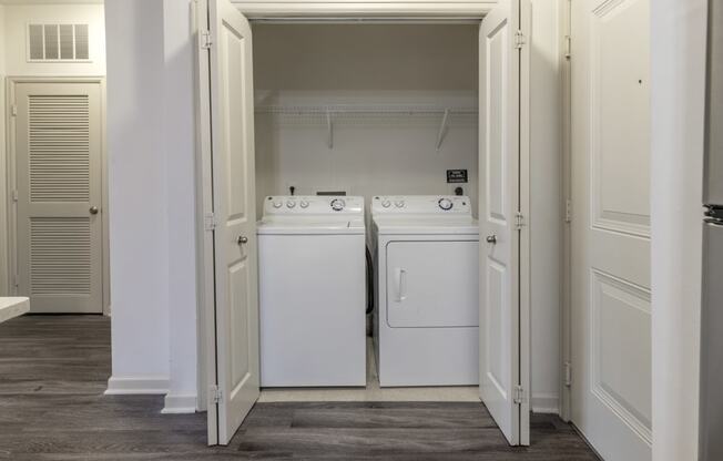 The Hendrix Apartments in Atlanta a laundry room with a washer and a dryer at The Hendrix, Georgia, 30329